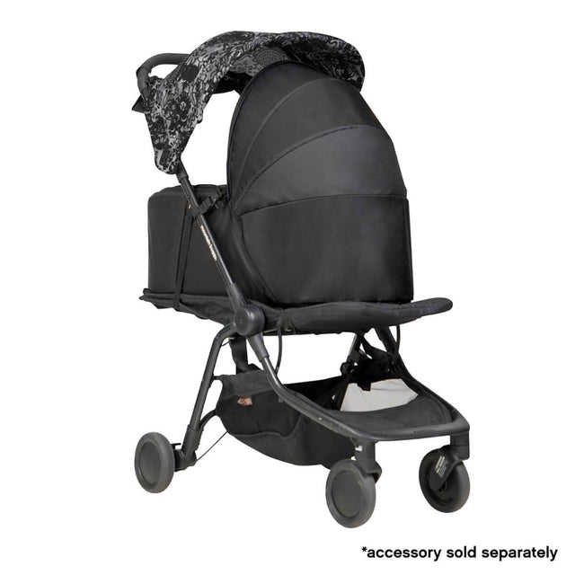 Mountain Buggy newborn cocoon fited on a year of the pig nano in colour black_black