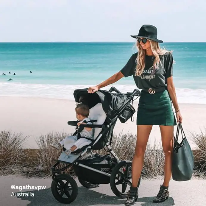 Mountain Buggy terrain all terrain stroller – mom and toddler on coastal path with beach view, Australia