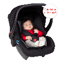 phil&teds alpha infant car seat shown with a cute baby safely harnessed into the capsule